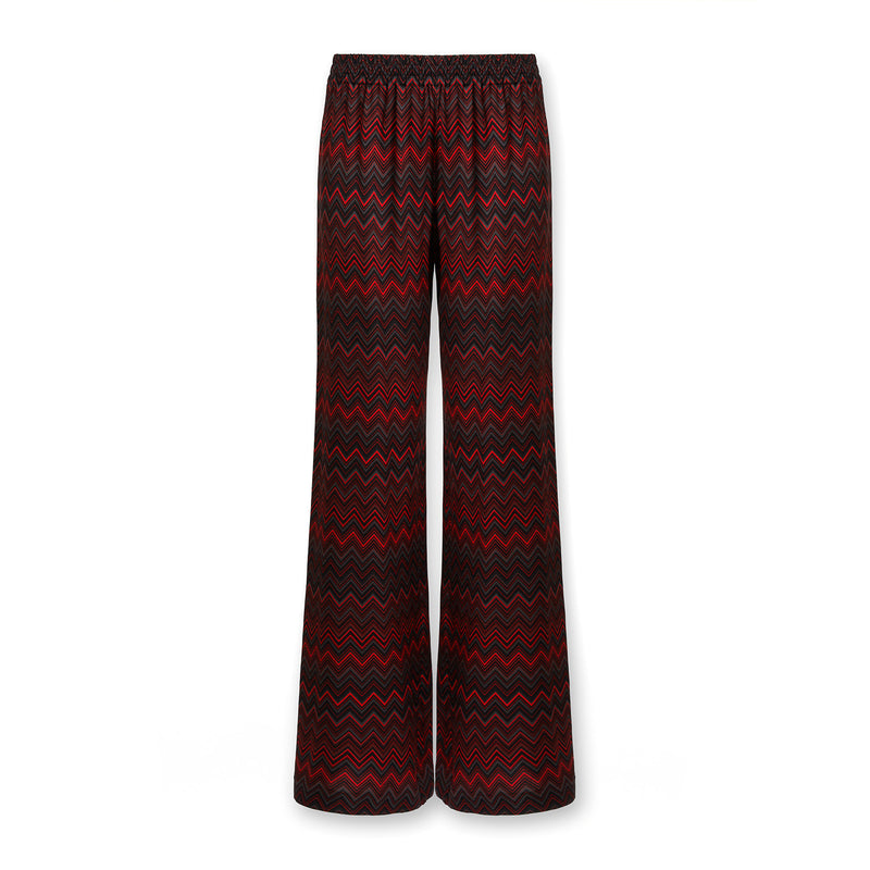 Lunar New Year capsule collection pants with zigzag pattern in red tones and with elastic waistband